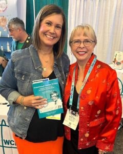 Pictured left to right: Kristin and Paula at WOCNext® 2024 in Cleveland, Ohio.